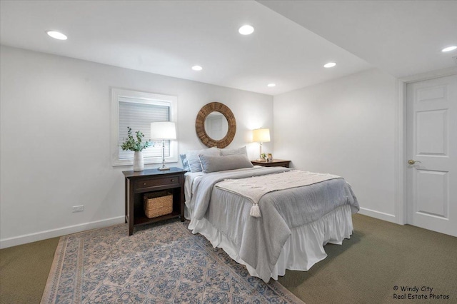 bedroom with dark carpet