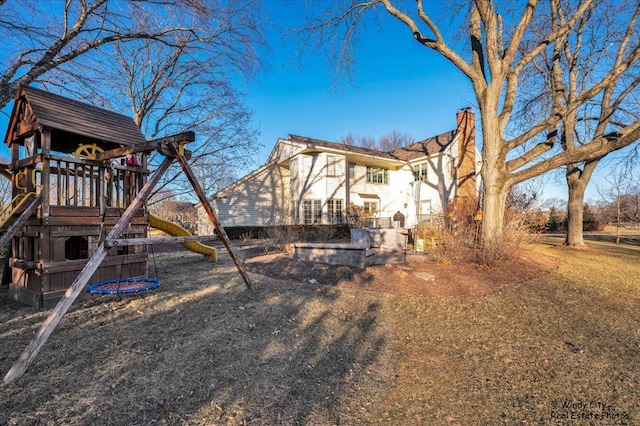 view of yard with a playground