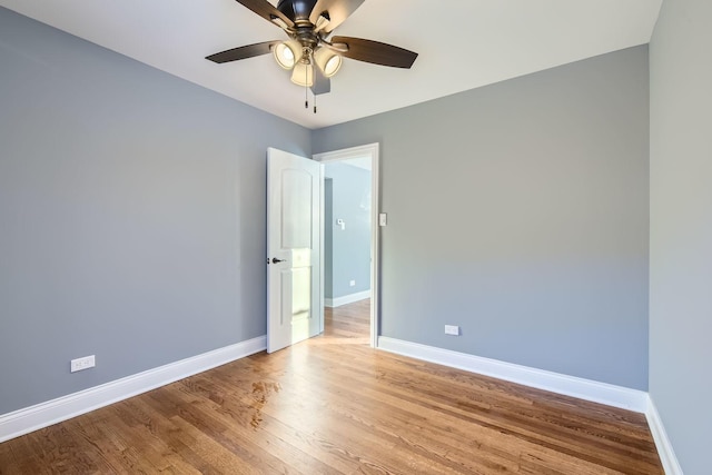 unfurnished room featuring ceiling fan and light hardwood / wood-style floors