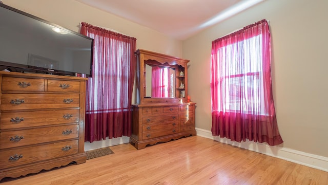 unfurnished bedroom with light hardwood / wood-style flooring