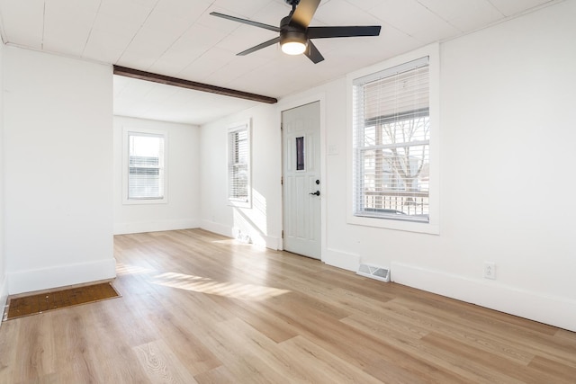 interior space featuring light wood-type flooring and ceiling fan