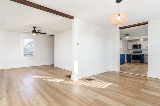 interior space with light hardwood / wood-style flooring and ceiling fan