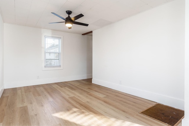 spare room with light hardwood / wood-style floors and ceiling fan