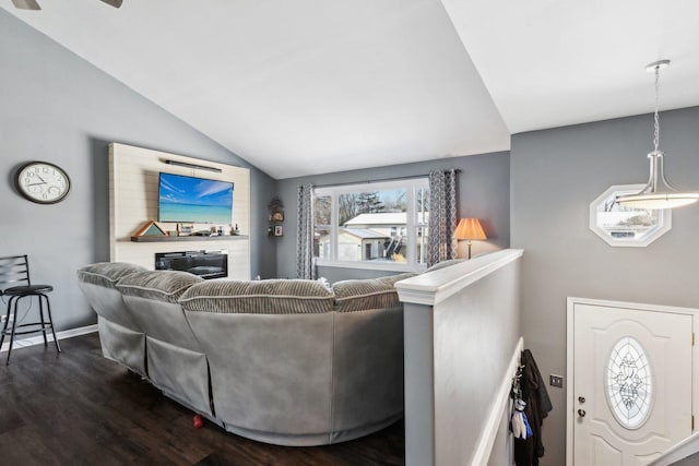 living room with vaulted ceiling and wood-type flooring