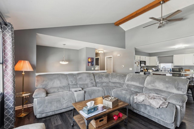 living room featuring sink, lofted ceiling with beams, ceiling fan, and dark hardwood / wood-style floors