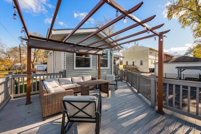 wooden terrace with an outdoor living space and a pergola