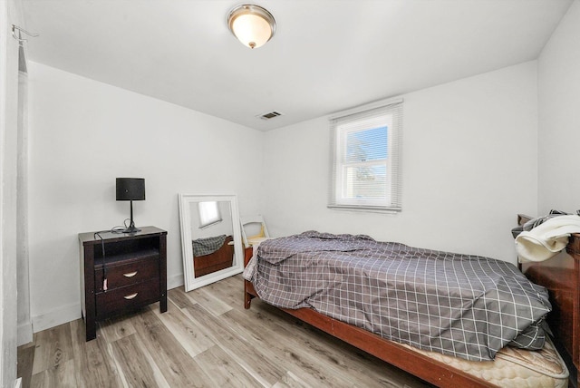 bedroom featuring light wood-type flooring