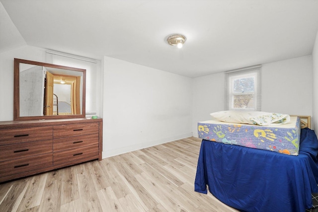 bedroom featuring light wood-type flooring