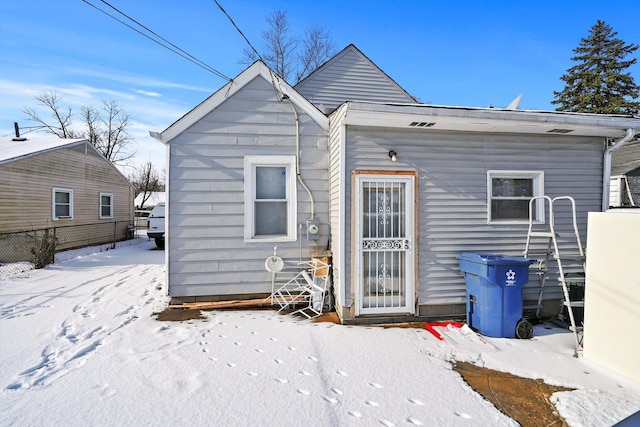 view of snow covered property