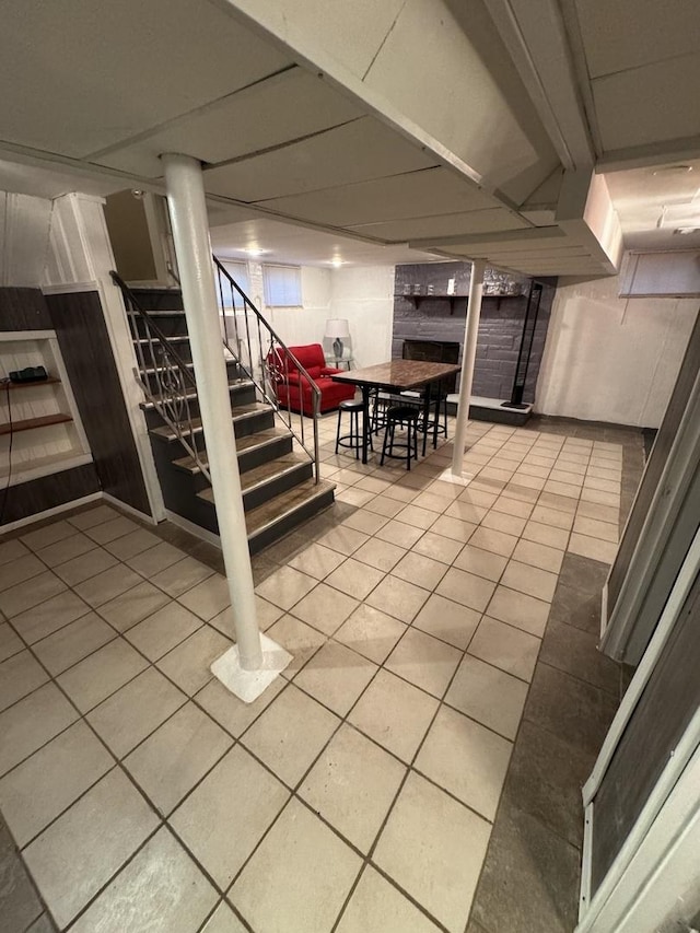 basement with tile patterned flooring