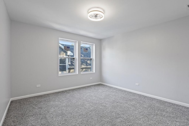 empty room with carpet flooring