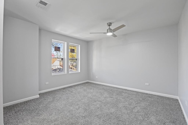 carpeted empty room with ceiling fan