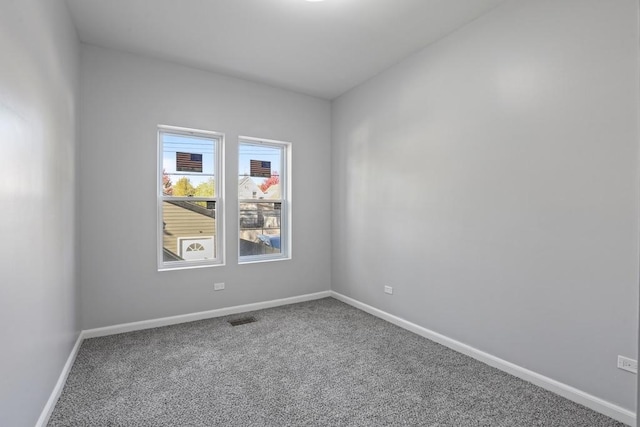 view of carpeted spare room