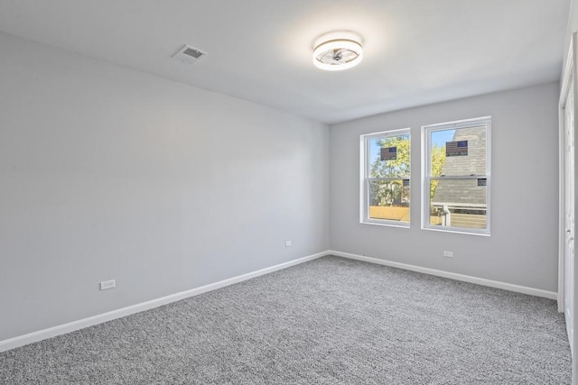 view of carpeted spare room