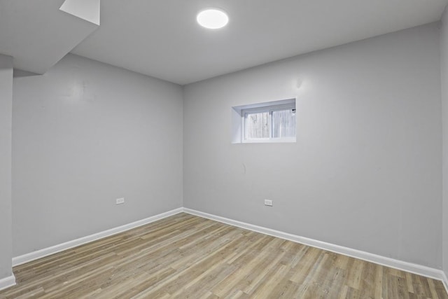 spare room with light hardwood / wood-style floors