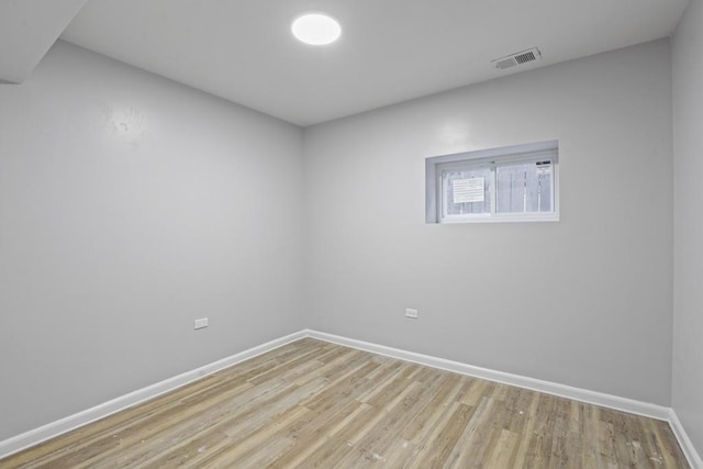 unfurnished room featuring light hardwood / wood-style floors