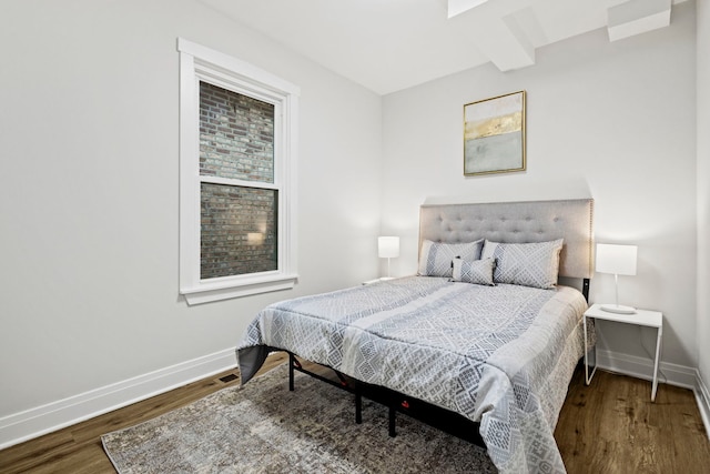 bedroom featuring hardwood / wood-style floors