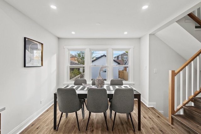 dining space featuring light hardwood / wood-style flooring