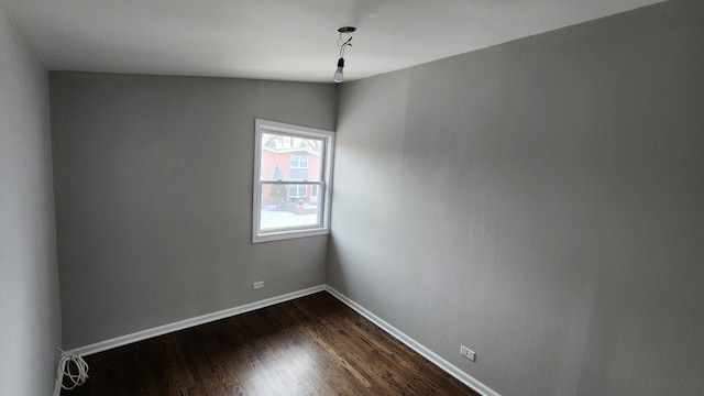 empty room with wood-type flooring