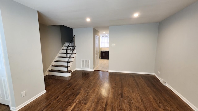 basement with wood-type flooring