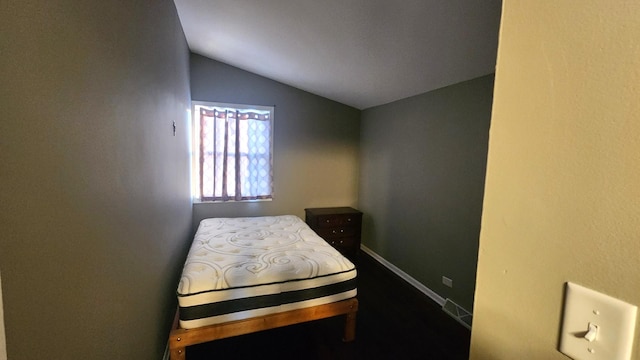 bedroom with vaulted ceiling