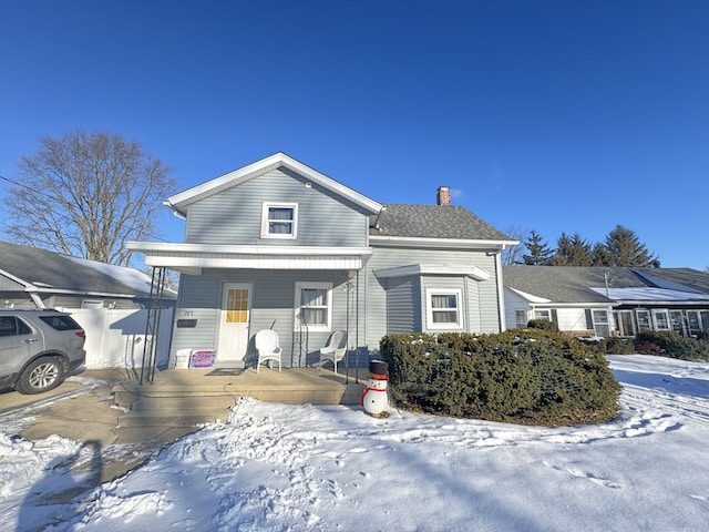 view of front of property featuring covered porch