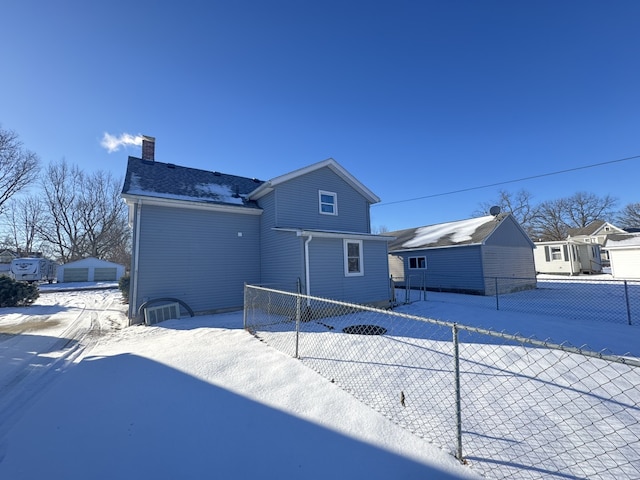 view of snow covered property