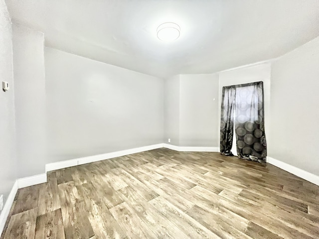 unfurnished room featuring light wood-type flooring