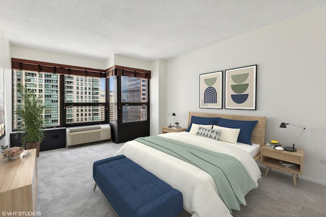 carpeted bedroom featuring a textured ceiling and an AC wall unit