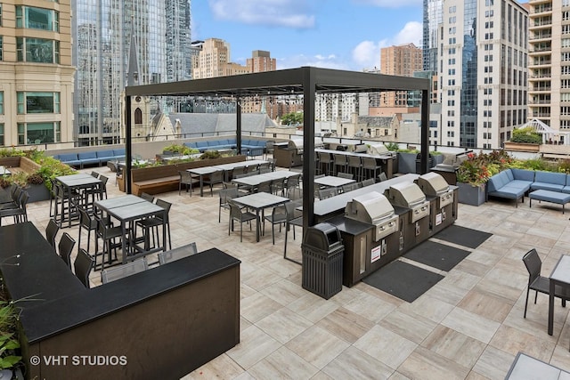 view of patio with a grill and an outdoor hangout area