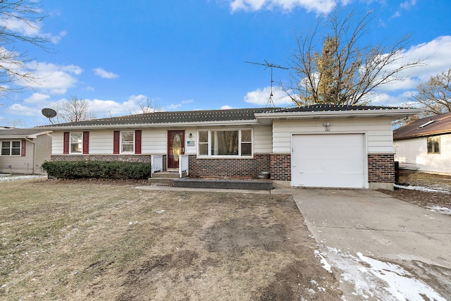 ranch-style home with a garage