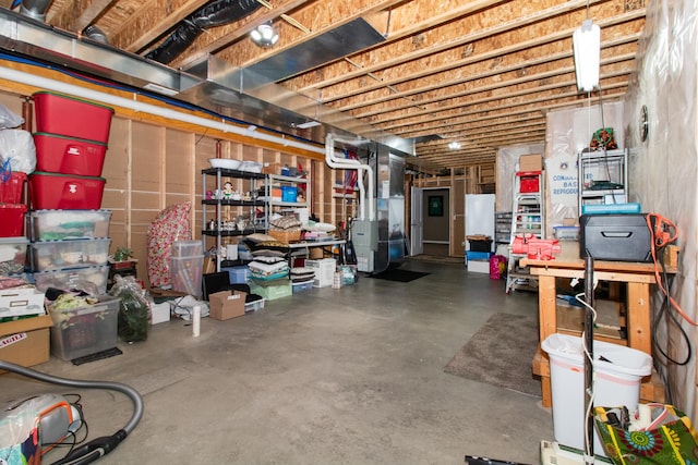 basement featuring heating unit