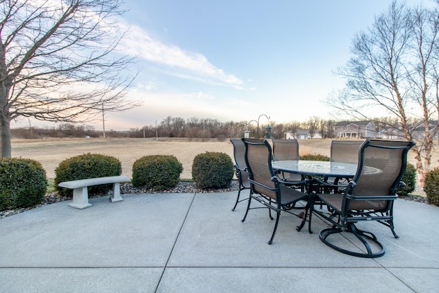 view of patio terrace at dusk