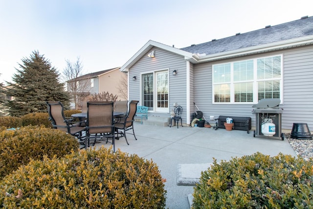 rear view of house featuring a patio