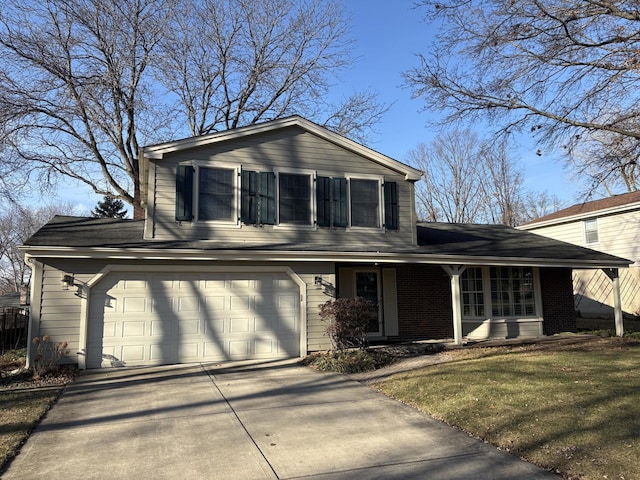 front facade featuring a garage and a front lawn