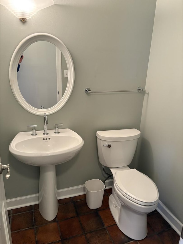 bathroom featuring toilet