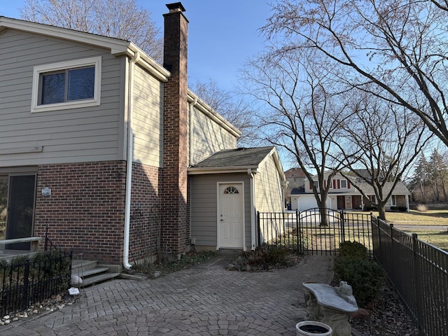 view of home's exterior with a patio area