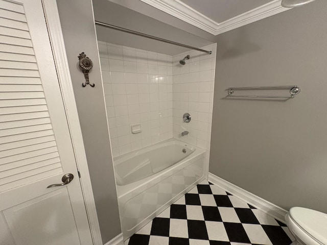 bathroom featuring crown molding, tiled shower / bath combo, and toilet