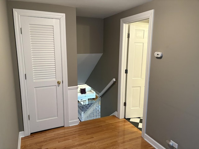 hallway with light wood-type flooring