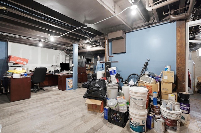 basement featuring light hardwood / wood-style flooring