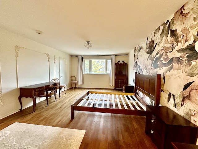 miscellaneous room featuring wood-type flooring