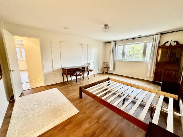 sitting room with hardwood / wood-style floors