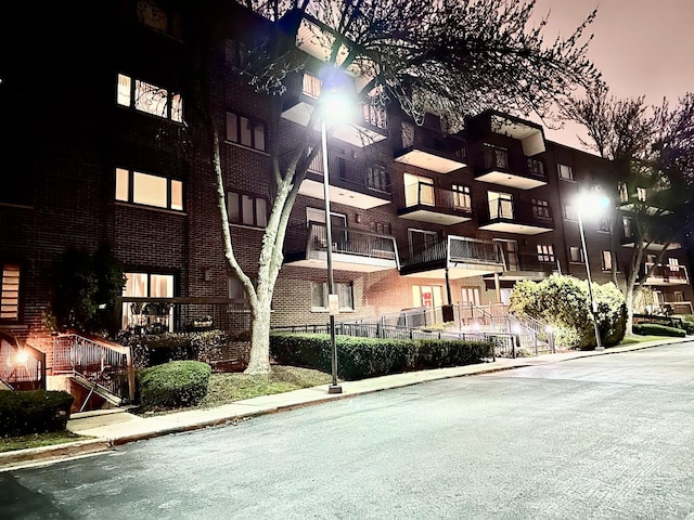 view of outdoor building at dusk