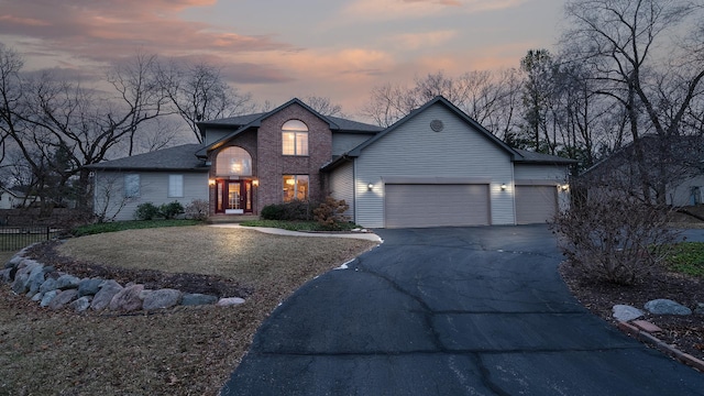 view of front of property featuring a garage