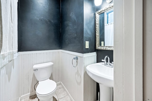 bathroom with sink and toilet