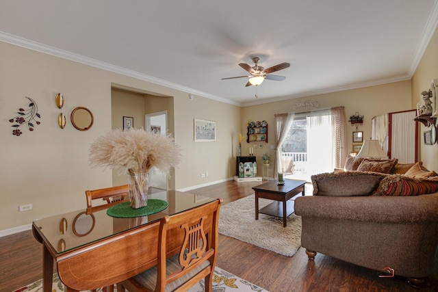 living room with ceiling fan, dark hardwood / wood-style flooring, and crown molding