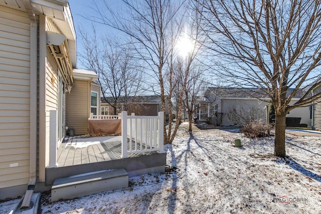 view of snow covered deck