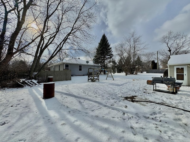 view of yard covered in snow