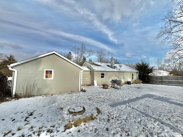 view of snow covered house