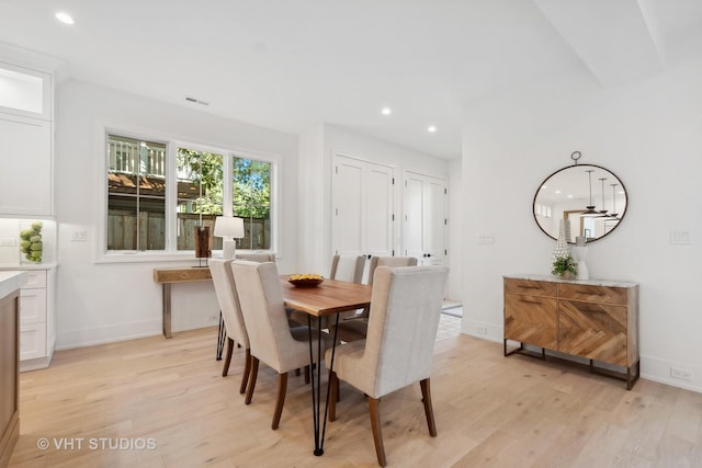 dining area with light hardwood / wood-style flooring